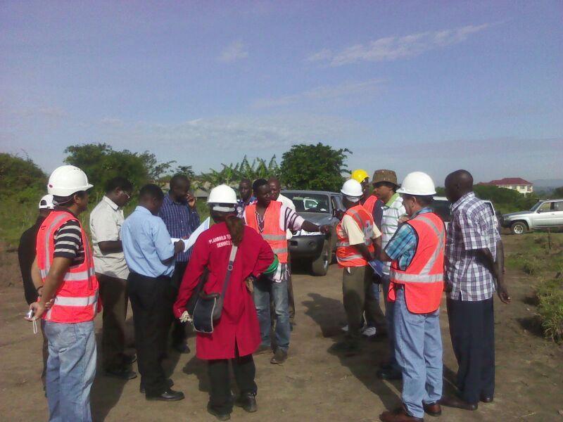 Planbuild staff in site meeting with client
